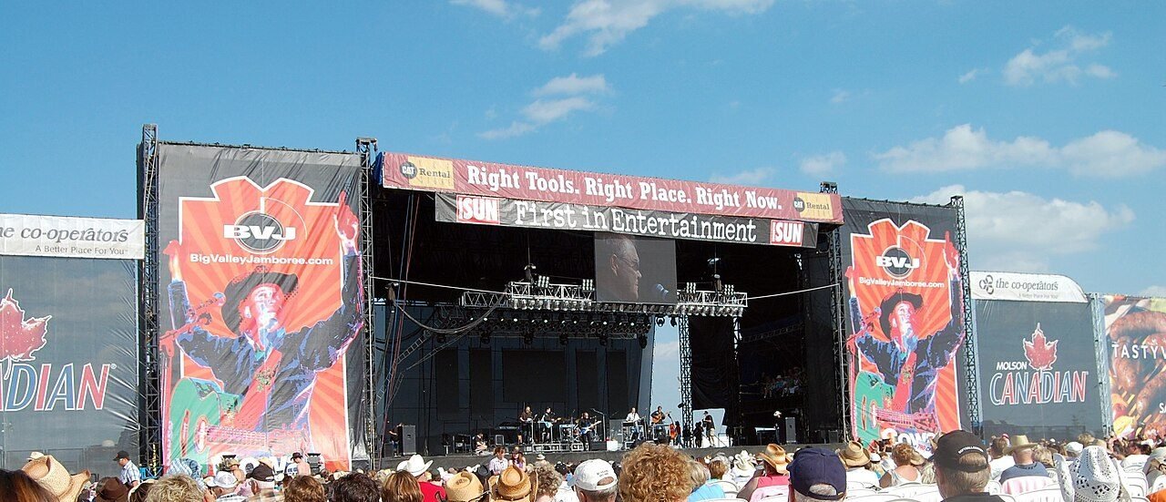 Glen Campbell performing on the Big Valley Jamboree main stage with the crowd below, 2009.